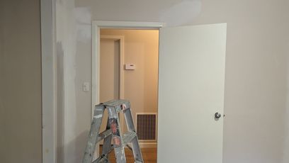 Wall and door painting work in progress photo