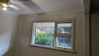 Wall and window painting work in progress photo