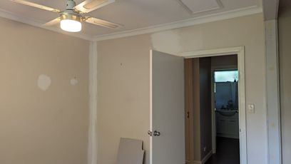 'Before' unevenly painted wall photo