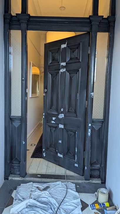 Work in progress photo of the entrance door